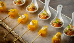 Little canapes food layout out in two tidy rows