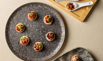 Three dishes with small canapes food